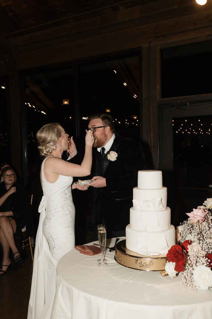 wedding reception featuring a cake with a bow at Deerpark