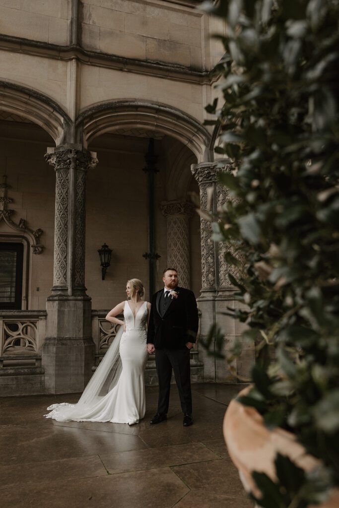 Biltmore estate wedding photos in front of the mansion arches