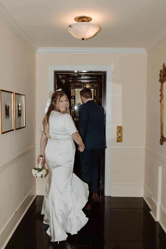 modern bride and groom elevator portraits at hotel Sorrento in downtown seattle