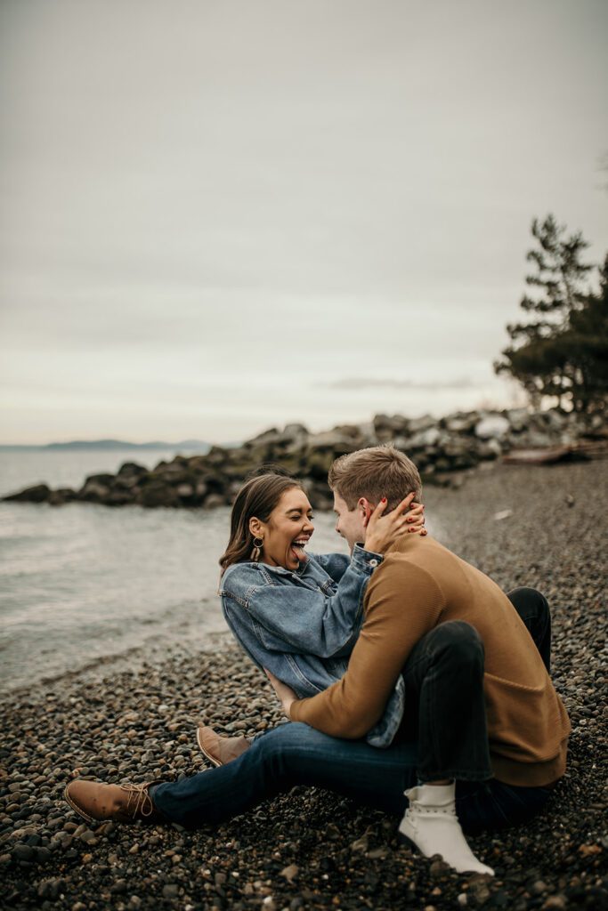 couple laughing during their engagement session at Olympic Sculpture Park 