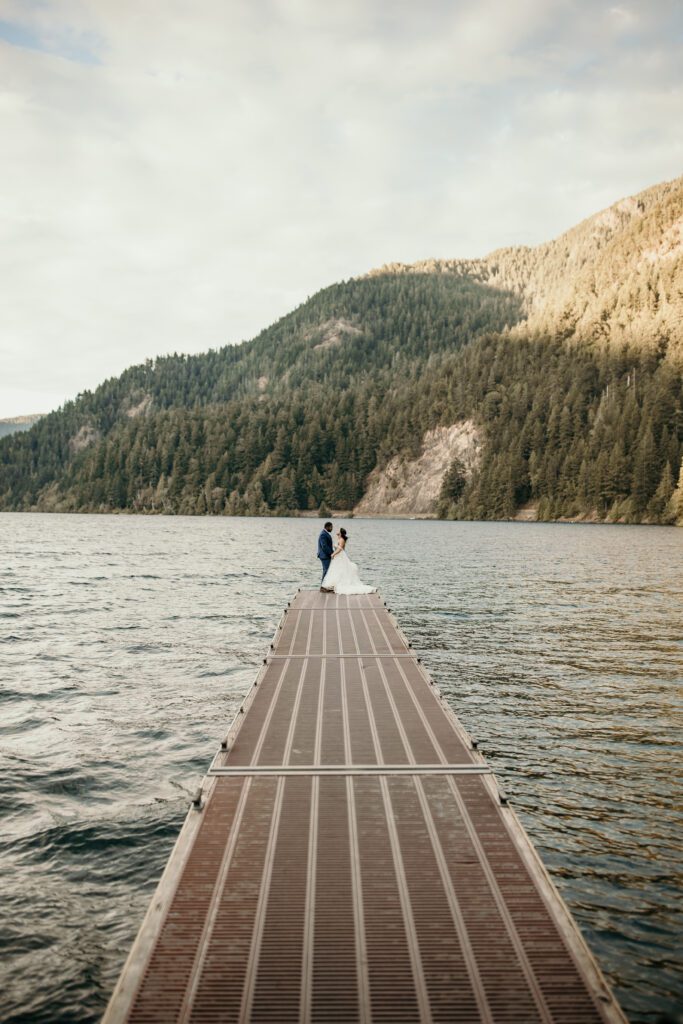 elopement-couple-on-deck-of-lake-crescent