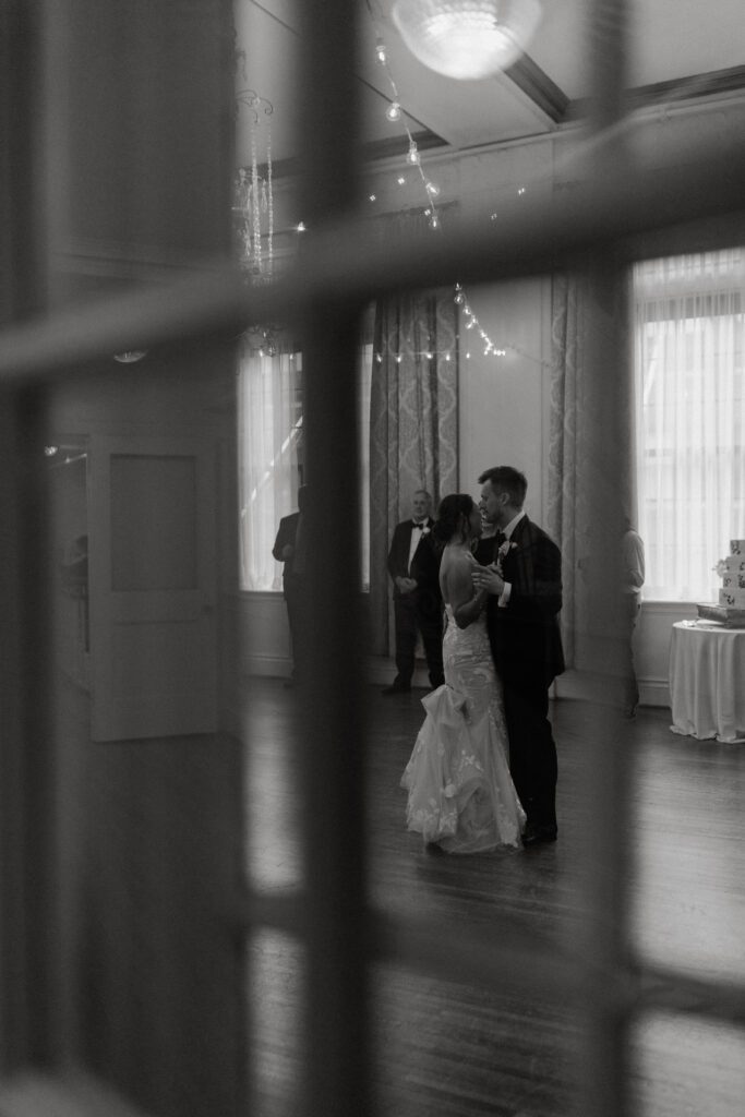 bride-and-grooms-first-dance-from-the-wedding-venue-balcony