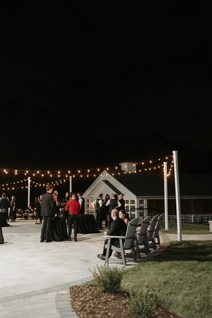 outdoor-wedding-reception-under-string-lights