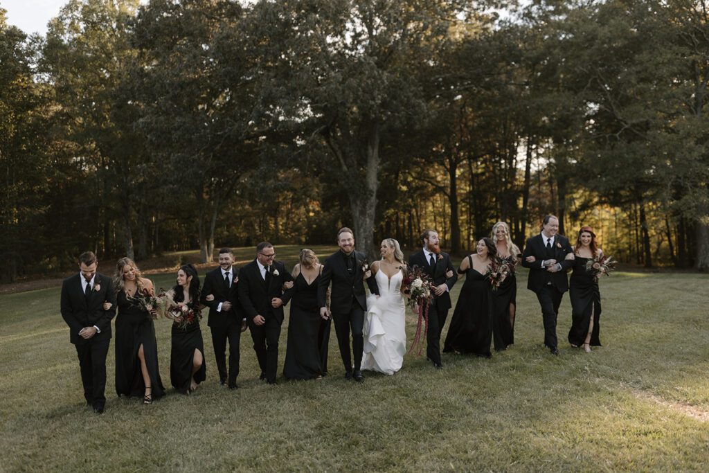 all-black-wedding-party-photos-with-jewel-toned-buoquets