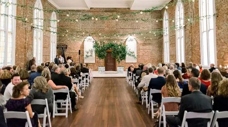historic brick wedding venue with arched windows in wilmington, North Carolina