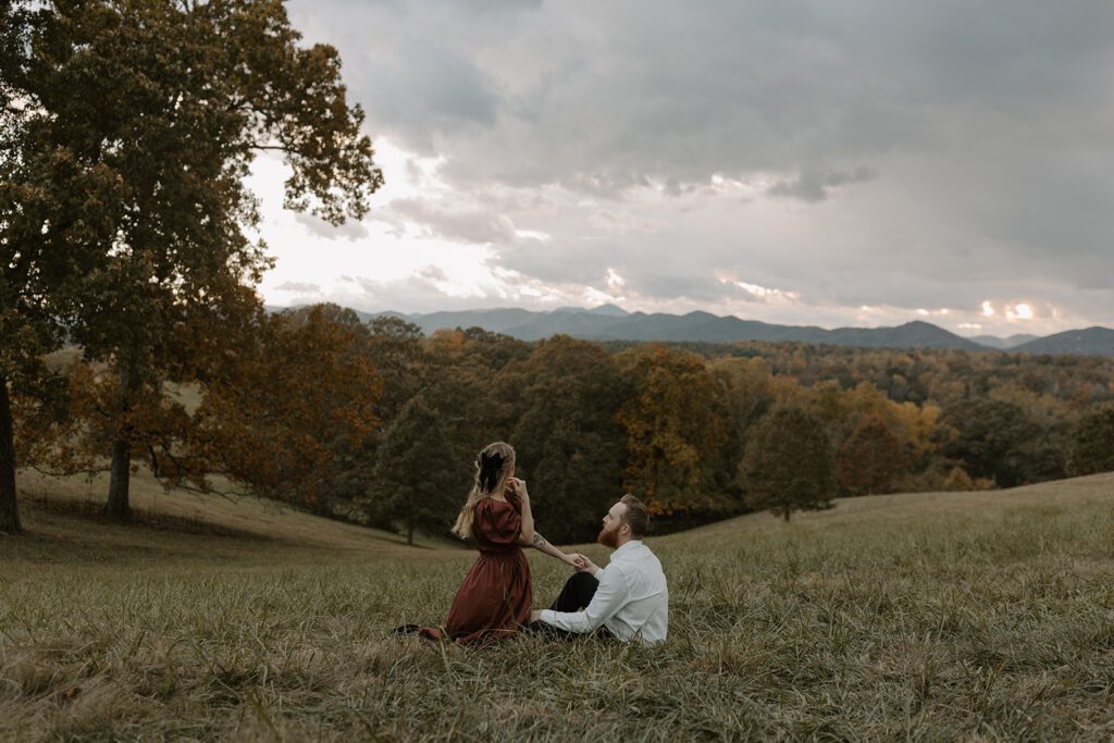 cinematic asheville engagement session with the blue ridge mountains at sunset