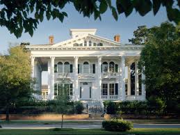 all white antebellum house facade of the Bellamy mansion wedding venue in downtown wilmington