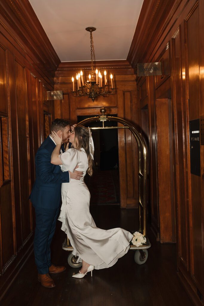bride and groom portraits in hotel elevator